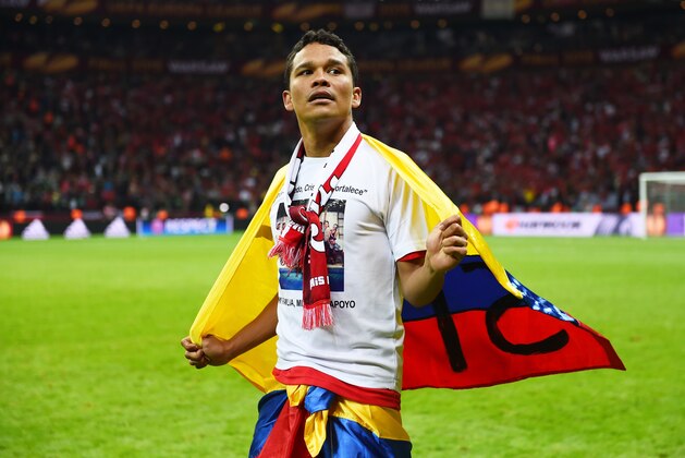 WARSAW, POLAND - MAY 27:  Carlos Bacca of Sevilla celebrates victory after the UEFA Europa League Final match between FC Dnipro Dnipropetrovsk and FC Sevilla on May 27, 2015 in Warsaw, Poland.  (Photo by Shaun Botterill/Getty Images)