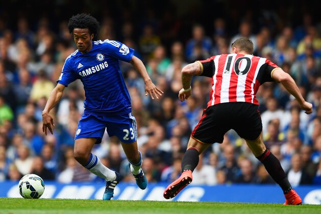 LONDON, ENGLAND - MAY 24: Juan Cuadrado of Chelsea and Connor Wickham of Sunderland compete for the ball during the Barclays Premier League match between Chelsea and Sunderland at Stamford Bridge on May 24, 2015 in London, England. (Photo by Mike Hewitt/Getty Images) LONDON, ENGLAND - MAY 24: Juan Cuadrado of Chelsea and Connor Wickham of Sunderland compete for the ball during the Barclays Premier League match between Chelsea and Sunderland at Stamford Bridge on May 24, 2015 in London, England. (Photo by Mike Hewitt/Getty Images)