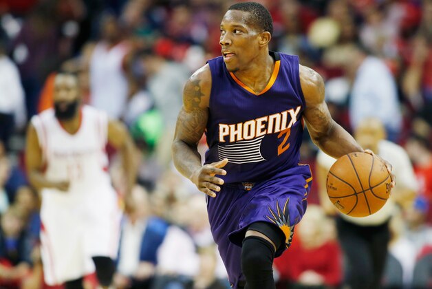 HOUSTON, TX - MARCH 21:  Eric Bledsoe #2 of the Phoenix Suns takes the basketball upcourt as James Harden #13 of the Houston Rockets looks on during their game at the Toyota Center on March 21, 2015 in Houston, Texas. NOTE TO USER: User expressly acknowledges and agrees that, by downloading and/or using this photograph, user is consenting to the terms and conditions of the Getty Images License Agreement.  (Photo by Scott Halleran/Getty Images)