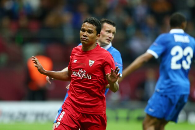 WARSAW, POLAND - MAY 27:  Carlos Bacca of Sevilla celebrates scoring his team's third goal during the UEFA Europa League Final match between FC Dnipro Dnipropetrovsk and FC Sevilla on May 27, 2015 in Warsaw, Poland.  (Photo by Michael Steele/Getty Images)
