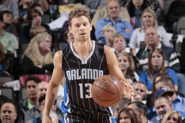 DALLAS, TX - MARCH 18: Luke Ridnour #13 of the Orlando Magic handles the ball against the Dallas Mavericks on March 18, 2015 at the American Airlines Center in Dallas, Texas. NOTE TO USER: User expressly acknowledges and agrees that, by downloading and or using this photograph, User is consenting to the terms and conditions of the Getty Images License Agreement. Mandatory Copyright Notice: Copyright 2015 NBAE (Photo by Glenn James/NBAE via Getty Images)