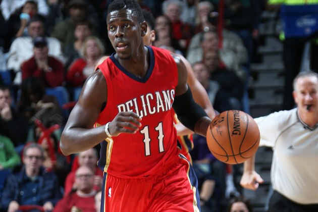 NEW ORLEANS, LA -DECEMBER 20: Jrue Holiday #11 of the New Orleans Pelicans handles the ball against the Portland Trail Blazers on December 20, 2014 at Smoothie King Center in New Orleans, LA. NOTE TO USER: User expressly acknowledges and agrees that, by downloading and or using this Photograph, user is consenting to the terms and conditions of the Getty Images License Agreement. Mandatory Copyright Notice: Copyright 2014 NBAE (Photo by Layne Murdoch/NBAE via Getty Images)