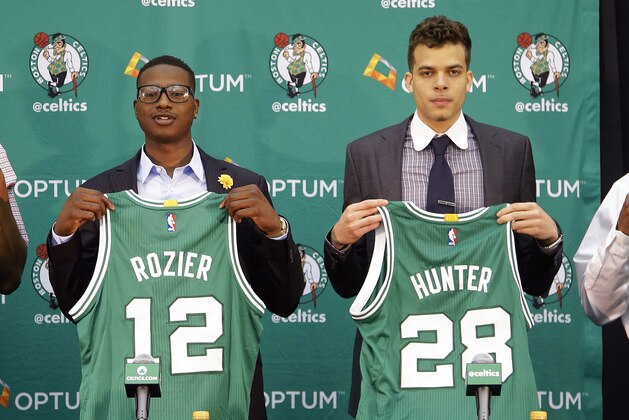 Boston Celtics draft picks Jordan Mickey, from left, Terry Rozier, R.J. Hunter and Marcus Thornton are introduced to the media at the Celtics basketball training facility, Tuesday, June 30, 2015, in Waltham, Mass. (AP Photo/Stephan Savoia)