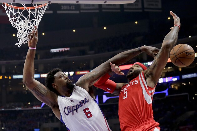 Los Angeles Clippers center DeAndre Jordan, left, fouls Houston Rockets forward Josh Smith during the first half of Game 6 in a second-round NBA basketball playoff series in Los Angeles, Thursday, May 14, 2015. (AP Photo/Jae C. Hong)