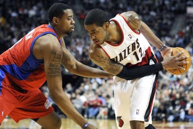 Portland Trail Blazers' LaMarcus Aldridge (12) works against Los Angeles Clippers' DeAndre Jordan (9) during the second half of an NBA basketball game in Portland, Ore., Tuesday Feb 16, 2010. (AP Photo/Greg Wahl-Stephens)