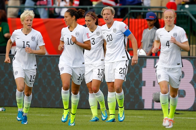 EDMONTON, AB - JUNE 22:  Alex Morgan #13 and Abby Wambach #20 of the United States celebrate after Morgan scores her first goal against goalkeeper Stefany Castano #1 of Colombia in the second half in the FIFA Women's World Cup 2015 Round of 16 match at Commonwealth Stadium on June 22, 2015 in Edmonton, Canada.  (Photo by Kevin C. Cox/Getty Images)