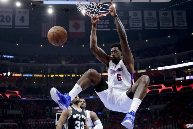 Los Angeles Clippers center DeAndre Jordan dunks against the San Antonio Spurs during Game 2 of a first-round NBA basketball playoff series in Los Angeles, Thursday, April 23, 2015. The Spurs won 111-107 in overtime. (AP Photo/Chris Carlson)