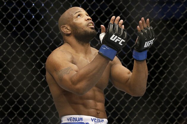 Yoel Romero celebrates after beating Clifford Starks in a UFC middleweight mixed martial arts fight in San Jose, Calif., Saturday, April 20, 2013. Romero won by knock out in the first round. (AP Photo/Jeff Chiu)
