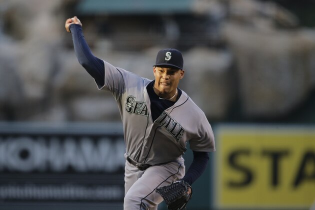 Seattle Mariners starting pitcher Taijuan Walker throws against the Los Angeles Angels during the first inning of a baseball game, Friday, June 26, 2015, in Anaheim, Calif. (AP Photo/Jae C. Hong)