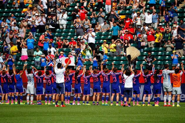 EDMONTON, AB - JUNE 27:  Japan celebrates their 1-0 win over Australia in the FIFA Women's World Cup Canada 2015 Quarter Final match between Australia and Japan at Commonwealth Stadium on June 27, 2015 in Edmonton, Canada.  (Photo by Kevin C. Cox/Getty Images)