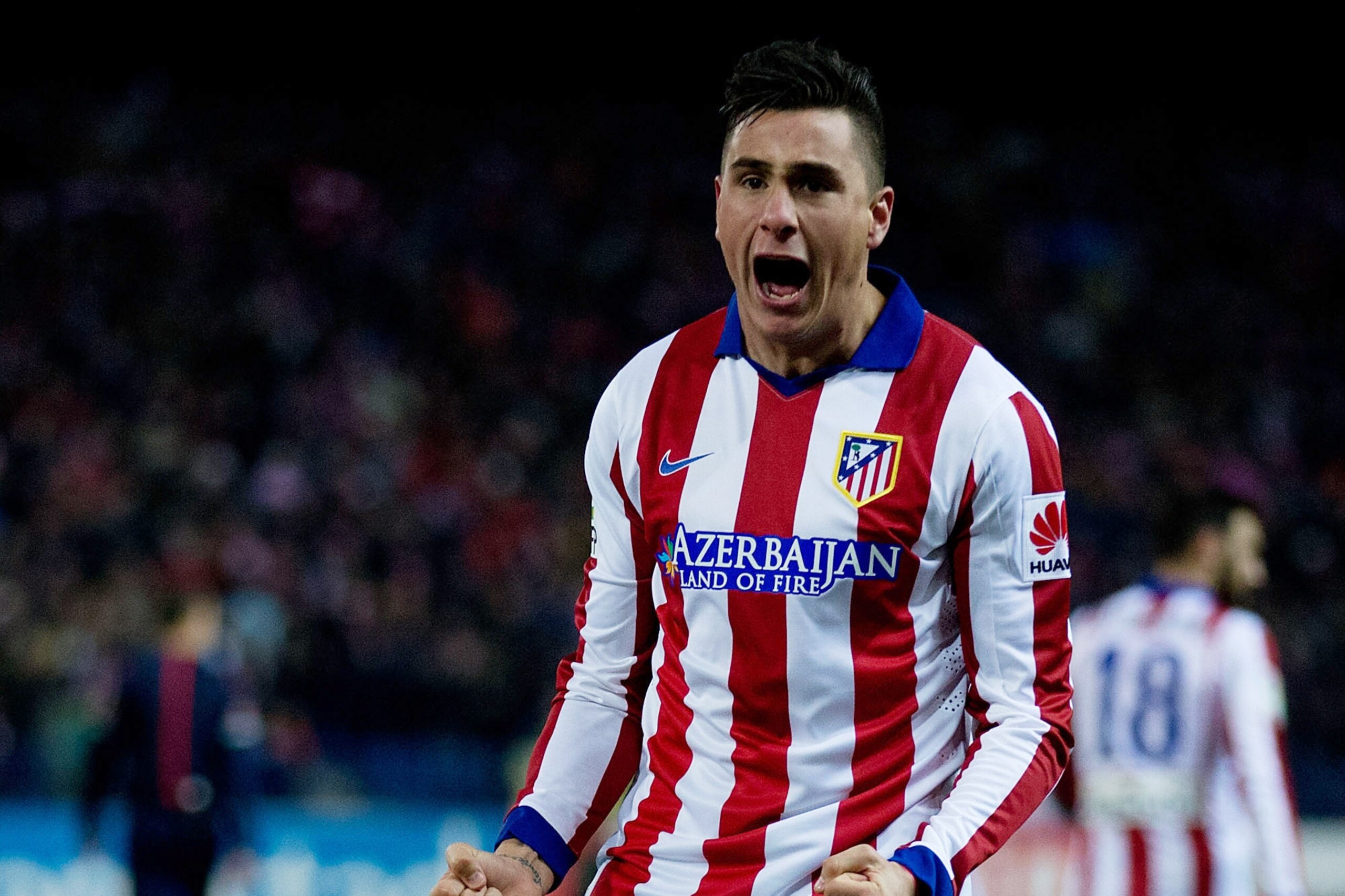 MADRID, SPAIN - JANUARY 07: Jose Maria Gimenez of Atletico de Madrid celebrates scoring their second goal during the Copa del Rey Round of 16  first leg match between Club Atletico de Madrid and Real Madrid CF at Vicente Calderon Stadium on January 7, 2015 in Madrid, Spain.  (Photo by Gonzalo Arroyo Moreno/Getty Images)