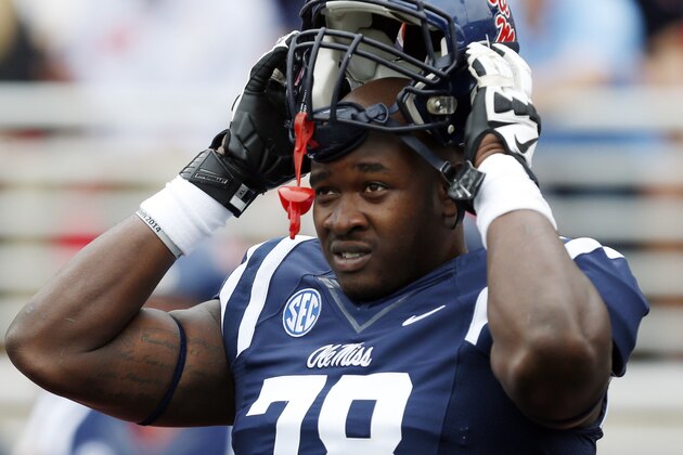Mississippi offensive linesman Laremy Tunsil (78) looks around during pre-game warmups prior to an NCAA college football game against Louisiana-Lafayette at Vaught-Hemingway Stadium in Oxford, Miss., Saturday, Sept. 13, 2014. (AP Photo/Rogelio V. Solis)