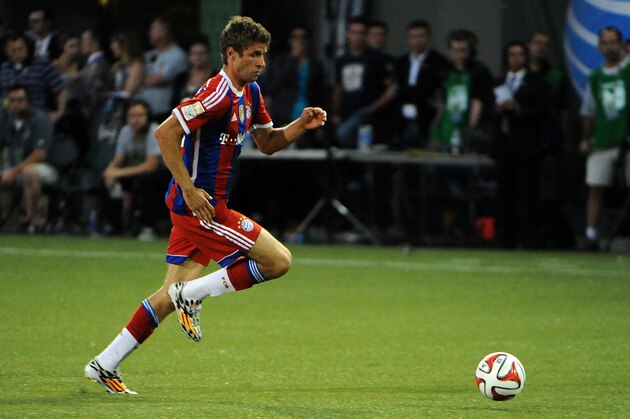PORTLAND, OR - AUGUST 06: Thomas Muller #25 of Bayern Munich brings the ball up the pitch during the second half of the game against the MLS All-Stars  at Providence Park on August 6, 2014 in Portland, Oregon.  (Photo by Steve Dykes/Getty Images)