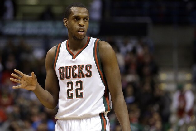Milwaukee Bucks' Khris Middleton communicates with a teammate during Game 4 of an NBA basketball first-round playoff series against the Chicago Bulls Saturday, April 25, 2015, in Milwaukee.