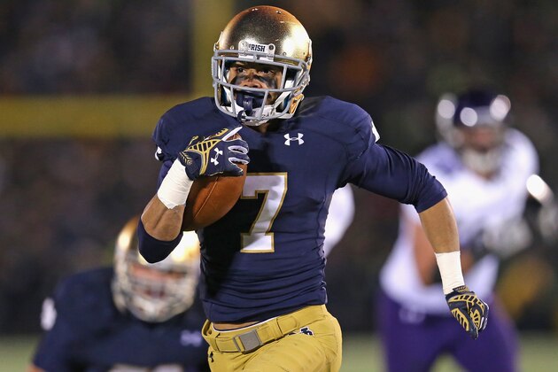 SOUTH BEND, IN - NOVEMBER 15: Will Fuller #7 of the Notre Dame Fighting Irish runs for a touchdown against the Northwestern Wildcats at Notre Dame Stadium on November 15, 2014 in South Bend, Indiana. Northwestern defeated Notre Dame 43-40 in overtime. (Photo by Jonathan Daniel/Getty Images)
