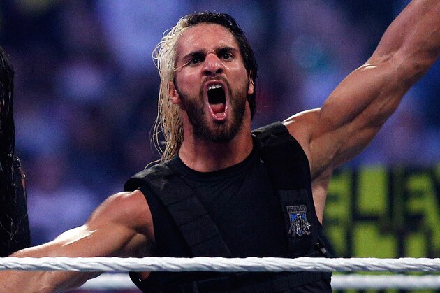 The Shield reacts after their win during Wrestlemania XXX at the Mercedes-Benz Super Dome in New Orleans on Sunday, April 6, 2014. (Jonathan Bachman/AP Images for WWE)