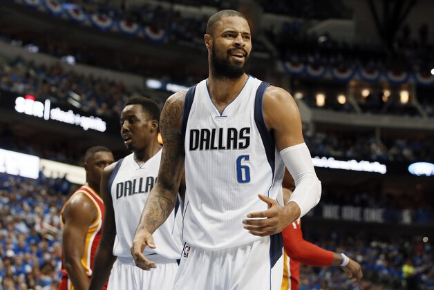 Dallas Mavericks' Tyson Chandler (6) looks toward and official after being charged with a foul against Houston Rockets' Dwight Howard in the first half of Game 4 in an NBA basketball first-round playoff series Sunday, April 26, 2015, in Dallas. (AP Photo/Tony Gutierrez)