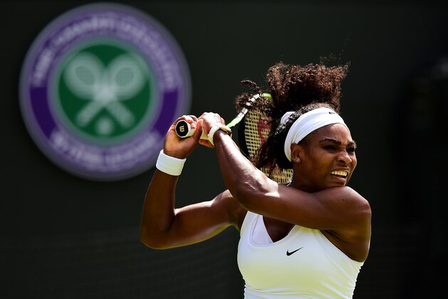 LONDON, ENGLAND - JUNE 29:  Serena Williams of the United States hits a backhand in her LadiesÂs Singles first round match against Margarita Gasparyan of Russia during day one of the Wimbledon Lawn Tennis Championships at the All England Lawn Tennis and Croquet Club on June 29, 2015 in London, England.  (Photo by Shaun Botterill/Getty Images)