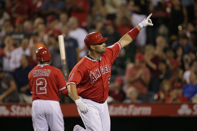 Los Angeles Angels' Albert Pujols celebrates his home run during the sixth inning of a baseball game against the New York Yankees, Tuesday, June 30, 2015, in Anaheim, Calif. (AP Photo/Jae C. Hong)