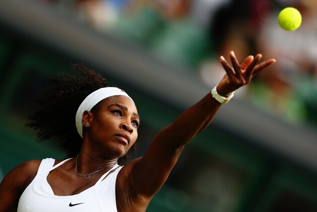LONDON, ENGLAND - JULY 01:  Serena Williams of the United States serves in her Ladies Singles Second Round match against Timea Babos of Hungary during day three of the Wimbledon Lawn Tennis Championships at the All England Lawn Tennis and Croquet Club on July 1, 2015 in London, England.  (Photo by Clive Brunskill/Getty Images)