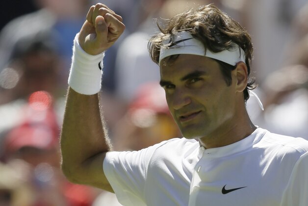 Roger Federer of Switzerland celebrates after defeating Damir Dzumhur of Bosnia in the singles first round match at the All England Lawn Tennis Championships in Wimbledon, London, Tuesday June 30, 2015. (AP Photo/Tim Ireland) Roger Federer of Switzerland celebrates after defeating Damir Dzumhur of Bosnia in the singles first round match at the All England Lawn Tennis Championships in Wimbledon, London, Tuesday June 30, 2015. (AP Photo/Tim Ireland)