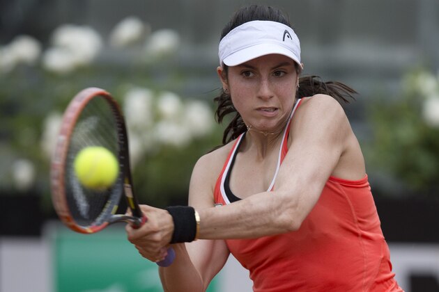 Christina McHale, of the US, returns the ball to Daria Gavrilova, of Russia, during their quarterfinal match at the Italian Open tennis tournament, in Rome, Friday, May 15, 2015. (AP Photo/Andrew Medichini)