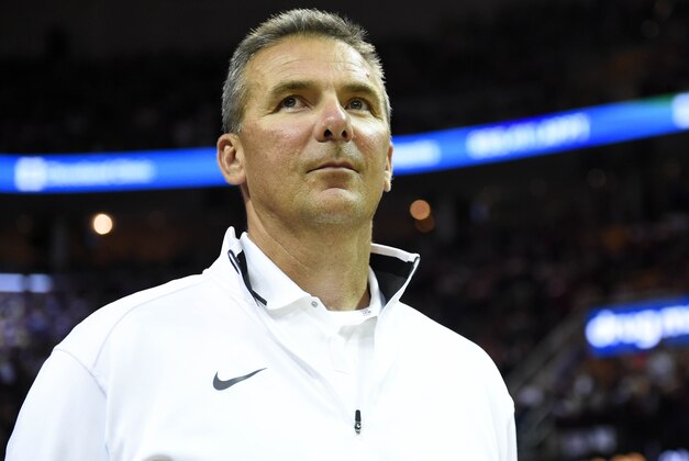 Jun 9, 2015; Cleveland, OH, USA; Ohio State Buckeyes football coach Urban Meyer in game three of the NBA Finals between the Golden State Warriors and the Cleveland Cavaliers at Quicken Loans Arena. Mandatory Credit: Bob Donnan-USA TODAY Sports
