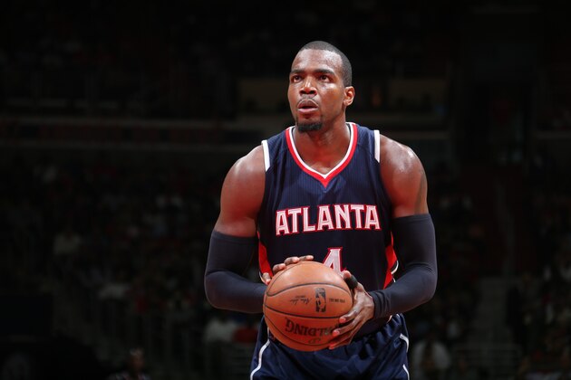 WASHINGTON, DC - MAY 11:  Paul Millsap #4 of the Atlanta Hawks prepares to shoot a free throw against the Washington Wizards in Game Four of the Eastern Conference Semifinals during the 2015 NBA Playoffs on May 11, 2015 at the Verizon Center in Washington, DC. NOTE TO USER: User expressly acknowledges and agrees that, by downloading and or using this Photograph, user is consenting to the terms and conditions of the Getty Images License Agreement. Mandatory Copyright Notice: Copyright 2015 NBAE (Photo by Ned Dishman/NBAE via Getty Images)