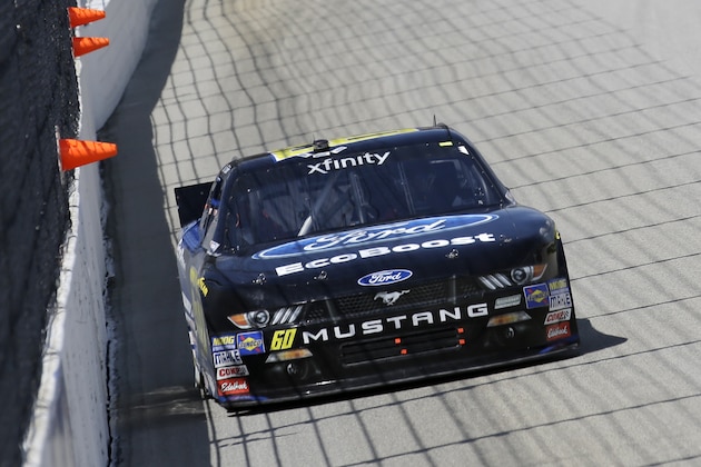 Chris Buescher (60) drives his car during the NASCAR Xfinity series auto race at Chicagoland Speedway, Sunday, June 21, 2015, in Joliet, Ill. (AP Photo/Nam Y. Huh)