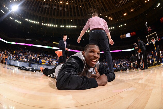 OAKLAND, CA - APRIL 2: Eric Bledsoe #2 of the Phoenix Suns stretches before facing the Golden State Warriors on April 2, 2015 at Oracle Arena in Oakland, California. NOTE TO USER: User expressly acknowledges and agrees that, by downloading and or using this photograph, user is consenting to the terms and conditions of Getty Images License Agreement. Mandatory Copyright Notice: Copyright 2015 NBAE (Photo by Noah Graham/NBAE via Getty Images)