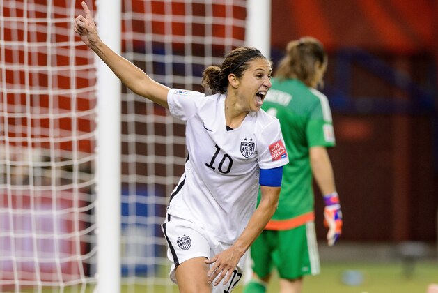 MONTREAL, QC - JUNE 30:  Carli Lloyd #10 of the United States celebrates after assisting on the goal by Kelley O'Hara #5 in the second half against Germany in the FIFA Women's World Cup 2015 Semi-Final Match at Olympic Stadium on June 30, 2015 in Montreal, Canada.  (Photo by Minas Panagiotakis/Getty Images)