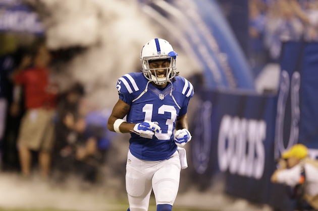 Indianapolis Colts' T.Y. Hilton (13) in introduced before a NFL wildcard playoff football game between the Indianapolis Colts and the Cincinnati Bengals Sunday, Jan. 4, 2015, in Indianapolis. (AP Photo/Michael Conroy)
