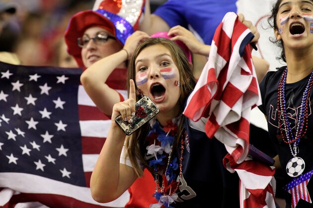 MONTREAL, QC - JUNE 30: Fans of the United States celebrate after the USA 2-0 victory against Germany in the FIFA Women's World Cup 2015 Semi-Final Match at Olympic Stadium on June 30, 2015 in Montreal, Canada. (Photo by Francois Laplante/FreestylePhoto/Getty Images) MONTREAL, QC - JUNE 30: Fans of the United States celebrate after the USA 2-0 victory against Germany in the FIFA Women's World Cup 2015 Semi-Final Match at Olympic Stadium on June 30, 2015 in Montreal, Canada. (Photo by Francois Laplante/FreestylePhoto/Getty Images)