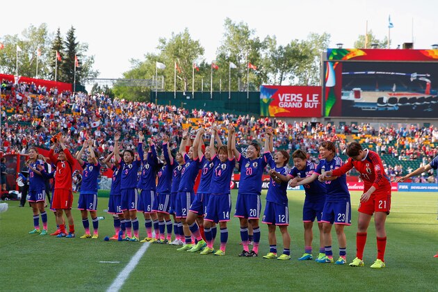 EDMONTON, AB - JULY 01: Japan celebrate after the FIFA Women's World Cup Semi Final match between Japan and England at the Commonwealth Stadium on July 1, 2015 in Edmonton, Canada.  (Photo by Kevin C. Cox/Getty Images)