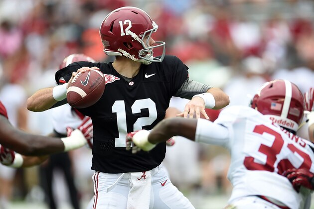 TUSCALOOSA, AL - APRIL 18:  David Cornwell #12 of the Crimson team drops back to pass against the White team during the University of Alabama A Day spring game at Bryant-Denny Stadium on April 18, 2015 in Tuscaloosa, Alabama.  (Photo by Stacy Revere/Getty Images)