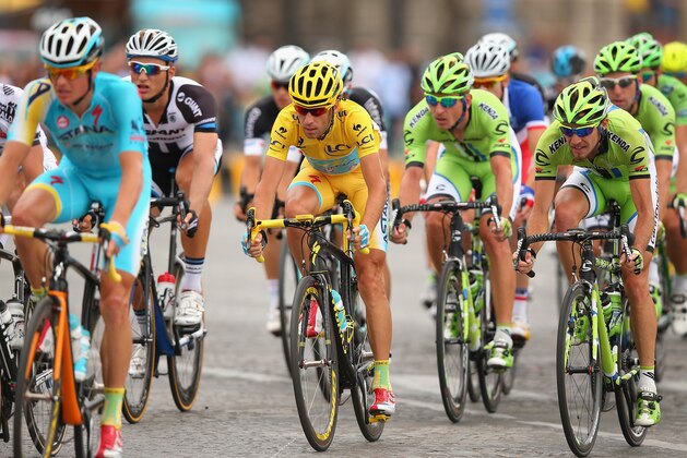 PARIS, FRANCE - JULY 27:  Vincenzo Nibali of Italy and Astana Pro Team in action during the twenty first stage of the 2014 Tour de France, a 138km stage from Evry into the Champs-Elysees, on July 27, 2014 in Paris, France.  (Photo by Bryn Lennon/Getty Images)