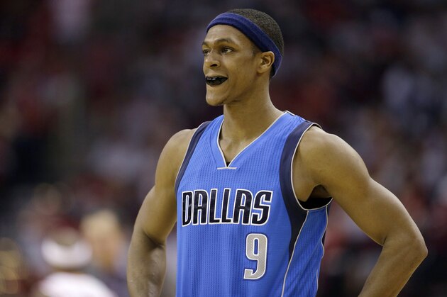 In this photo taken Tuesday, April 21, 2015, Dallas Mavericks' Rajon Rondo makes his way to bench after being called for a foul against the Houston Rockets during the third quarter of Game 2 in the first round in the NBA basketball playoffs in Houston. Rondo sat nearly the entire second half of the Mavs' loss to Houston and didn't get a lot of support from his coach afterward in what is clearly an experiment gone wrong.  (AP Photo/David J. Phillip, File)