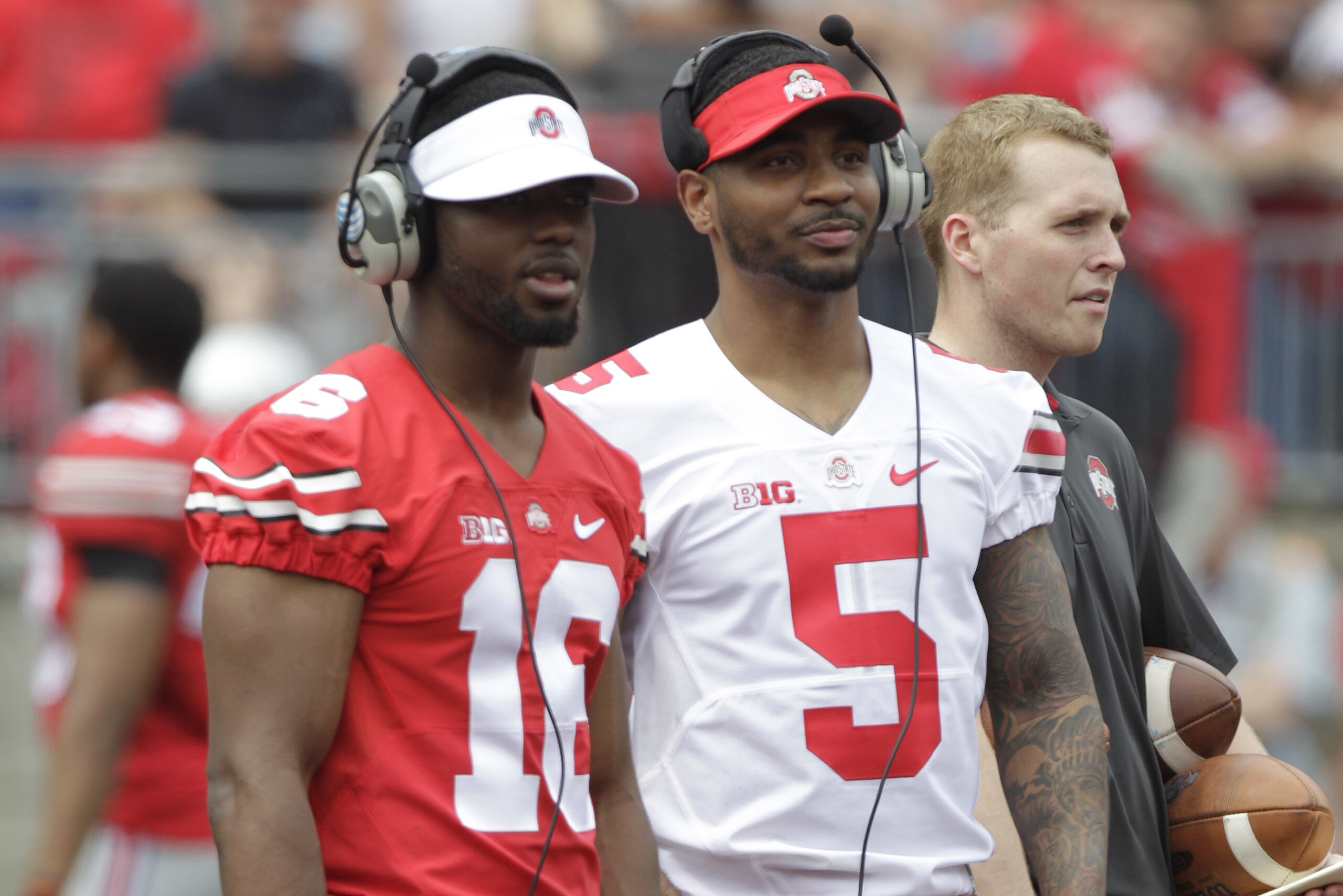 Ohio State quarterbacks Braxton MIller, right, and J.T. Barrett during Ohio State's NCAA college football Spring game Saturday, April 18, 2015, in Columbus, Ohio. (AP Photo/Jay LaPrete)