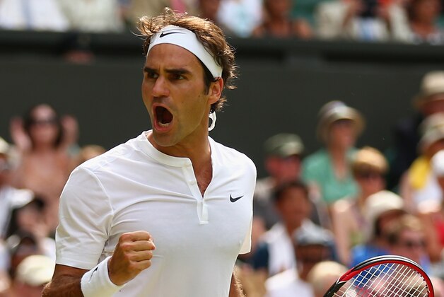 LONDON, ENGLAND - JULY 02:  Roger Federer of Switzerland celebrates a point during his Gentlemens Singles Second Round match against Sam Querry of the United States during day four of the Wimbledon Lawn Tennis Championships at the All England Lawn Tennis and Croquet Club on July 2, 2015 in London, England.  (Photo by Ian Walton/Getty Images)