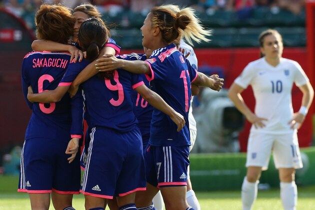 EDMONTON, AB - JULY 01:  Japan celebrate a late goal against England during the FIFA Women's World Cup Canada 2015 Semi Final match at Commonwealth Stadium on July 1, 2015 in Edmonton, Canada.  (Photo by Ronald Martinez/Getty Images)