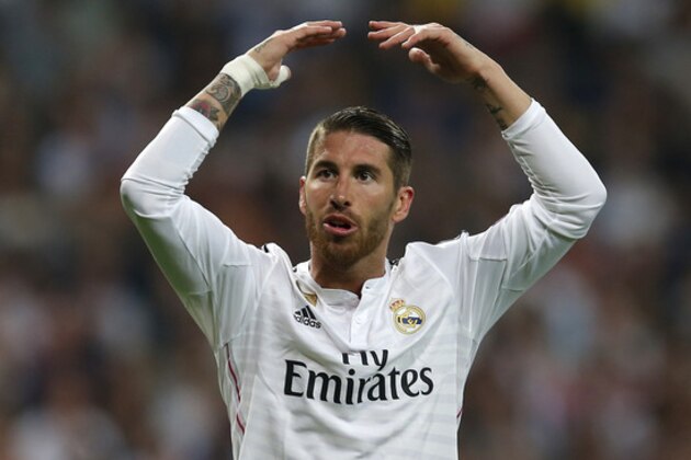 Real Madrid's Sergio Ramos gestures during the second leg quarterfinal Champions League soccer match between Real Madrid and Atletico Madrid at Santiago Bernabeu stadium in Madrid, Spain, Wednesday April 22, 2015. (AP Photo/Paul White)