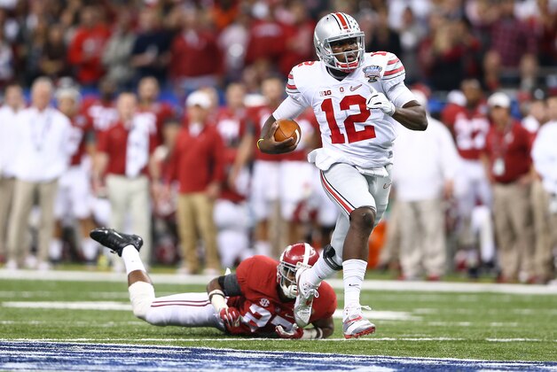 NEW ORLEANS, LA - JANUARY 01:  Cardale Jones #12 of the Ohio State Buckeyes runs the ball during the first half against Alabama  at the All State Sugar Bowl against Alabama Crimson Tide at the Mercedes-Benz Superdome on January 1, 2015 in New Orleans, Louisiana.  (Photo by Streeter Lecka/Getty Images)