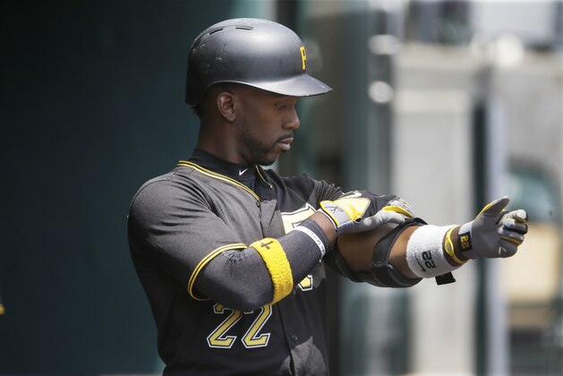 Pittsburgh Pirates center fielder Andrew McCutchen prepares to bat during the first inning of a baseball game against the Detroit Tigers, Thursday, July 2, 2015, in Detroit. (AP Photo/Carlos Osorio)