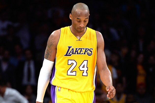LOS ANGELES, CA - JANUARY 15:  Kobe Bryant #24 of the Los Angeles Lakers reacts as the Lakers trail late in the fourth quarter to the Cleveland Cavaliers at Staples Center on January 15, 2015 in Los Angeles, California.  The Cavaliers won 109-102.   NOTE TO USER: User expressly acknowledges and agrees that, by downloading and or using this Photograph, user is consenting to the terms and condition of the Getty Images License Agreement.  (Photo by Harry How/Getty Images)