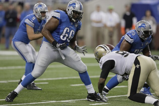 Detroit Lions tackle LaAdrian Waddle (66) blocks against the New Orleans Saints during the first half of an NFL football game in Detroit, Sunday, Oct. 19, 2014. (AP Photo/Duane Burleson)