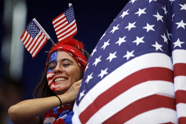 FILE - In this May 30, 2015, file photo, a spectator watches warm-ups before an international friendly soccer match between South Korea and the United States in Harrison, N.J. In broadcasting the Women's World Cup, Fox executives are thrilled for the chance to potentially see the favored U.S. team make a run to the title. But what can really draw in viewers is the realization that the Americans could lose. (AP Photo/Julio Cortez, File)