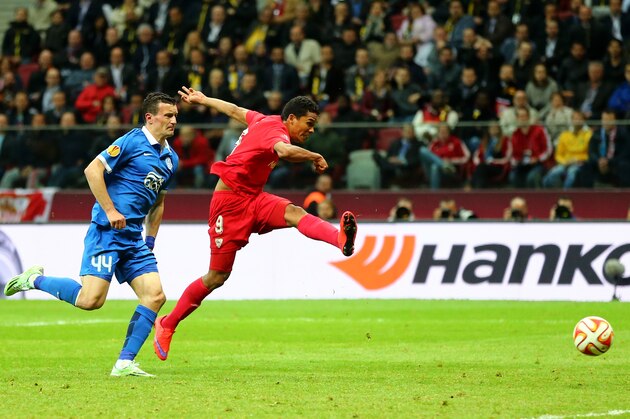 WARSAW, POLAND - MAY 27:  Carlos Bacca of Sevilla scores his team's third goal during the UEFA Europa League Final match between FC Dnipro Dnipropetrovsk and FC Sevilla on May 27, 2015 in Warsaw, Poland.  (Photo by Martin Rose/Getty Images)