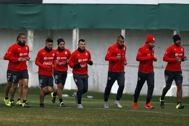Chile players jog during a team training session in Santiago, Chile, Thursday, July 2, 2015. Chile will face Argentina in the Copa America final on Saturday. (AP Photo/Luis Hidalgo) Chile players jog during a team training session in Santiago, Chile, Thursday, July 2, 2015. Chile will face Argentina in the Copa America final on Saturday. (AP Photo/Luis Hidalgo)