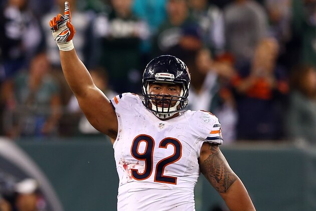 EAST RUTHERFORD, NJ - SEPTEMBER 22: Defensive tackle Stephen Paea #92 of the Chicago Bears celebrates against the New York Jets during a game at MetLife Stadium on September 22, 2014 in East Rutherford, New Jersey.  (Photo by Elsa/Getty Images)