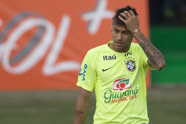 Brazil's soccer player Neymar gestures during a team training session in Santiago, Chile, Friday, June 19, 2015. Brazil will face Venezuela in a Copa America soccer match Sunday. (AP Photo/Silvia Izquierdo)